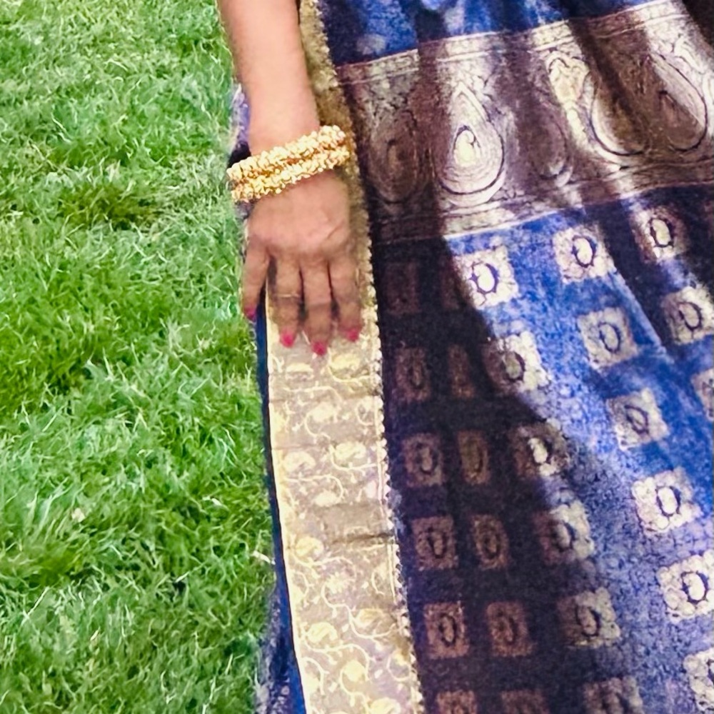 Elegant Blue and gold banarasi saree with ready made blouse.